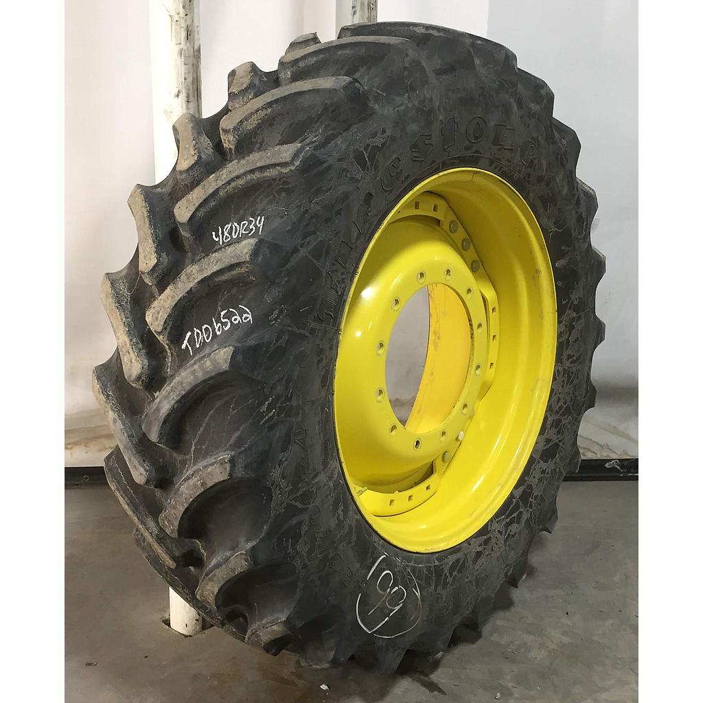 480/70R34 Firestone Radial 9000 R-1W on John Deere Yellow 12-Hole Waffle Wheel (Groups of 3 bolts) 90%