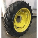 8.3/-24 BKT Tires TR 135 Drive R-1 on John Deere Yellow 8-Hole Rim with Clamp/U-Clamp (groups of 2 bolts) 65%