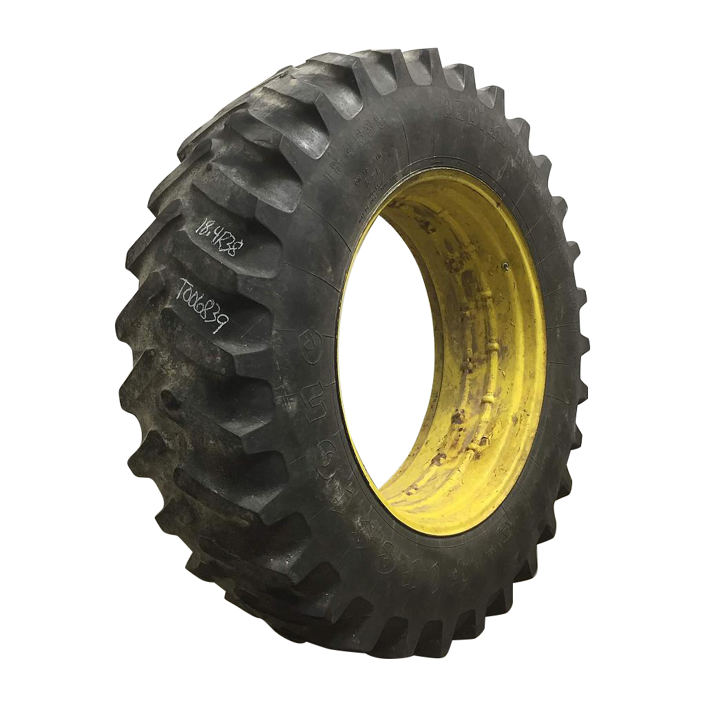 18.4/R38 Firestone Radial All Traction 23 R-1 on John Deere Yellow 0-Hole Double Bevel 38" Cast 35%