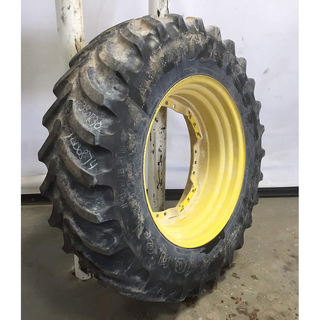 380/85R30 Firestone Radial All Traction FWD R-1 on John Deere Yellow 12-Hole Waffle Wheel (Groups of 3 bolts) 55%