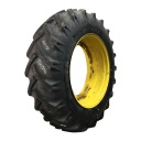 18.4/-38 BKT Tires TR 135 Drive R-1 on John Deere Yellow 12-Hole Stub Disc 60%