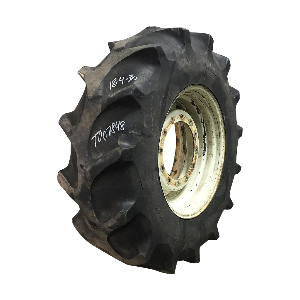 18.4/-30 Firestone Champion Spade Grip R-2 on New Holland White 12-Hole Waffle Wheel (Groups of 2 bolts) 25%