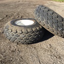 23.1/-26 Firestone All Non-Skid Tractor R-3 on New Holland White 8-Hole Formed Plate 99%
