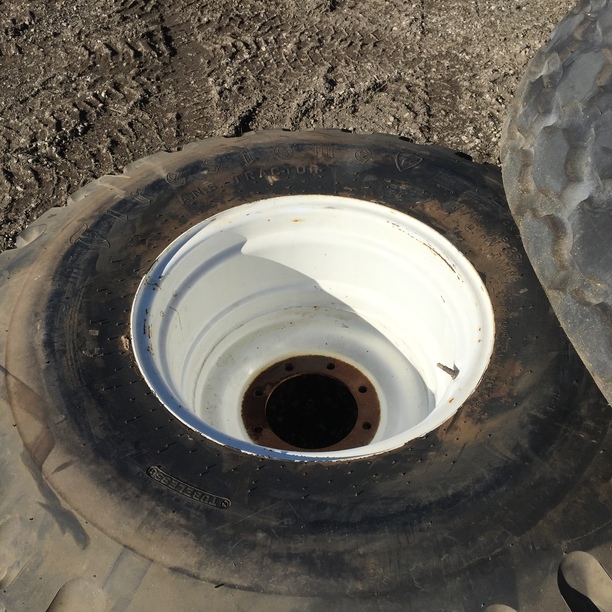 23.1/-26 Firestone All Non-Skid Tractor R-3 on New Holland White 8-Hole Formed Plate 99%
