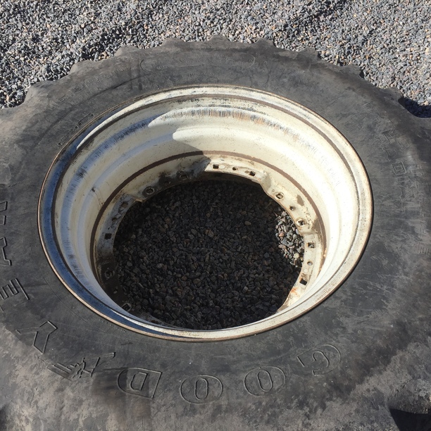 16.9/R30 Goodyear Farm Dyna Torque Radial R-1 on White 8-Hole Waffle Wheel (Groups of 2 bolts) 40%
