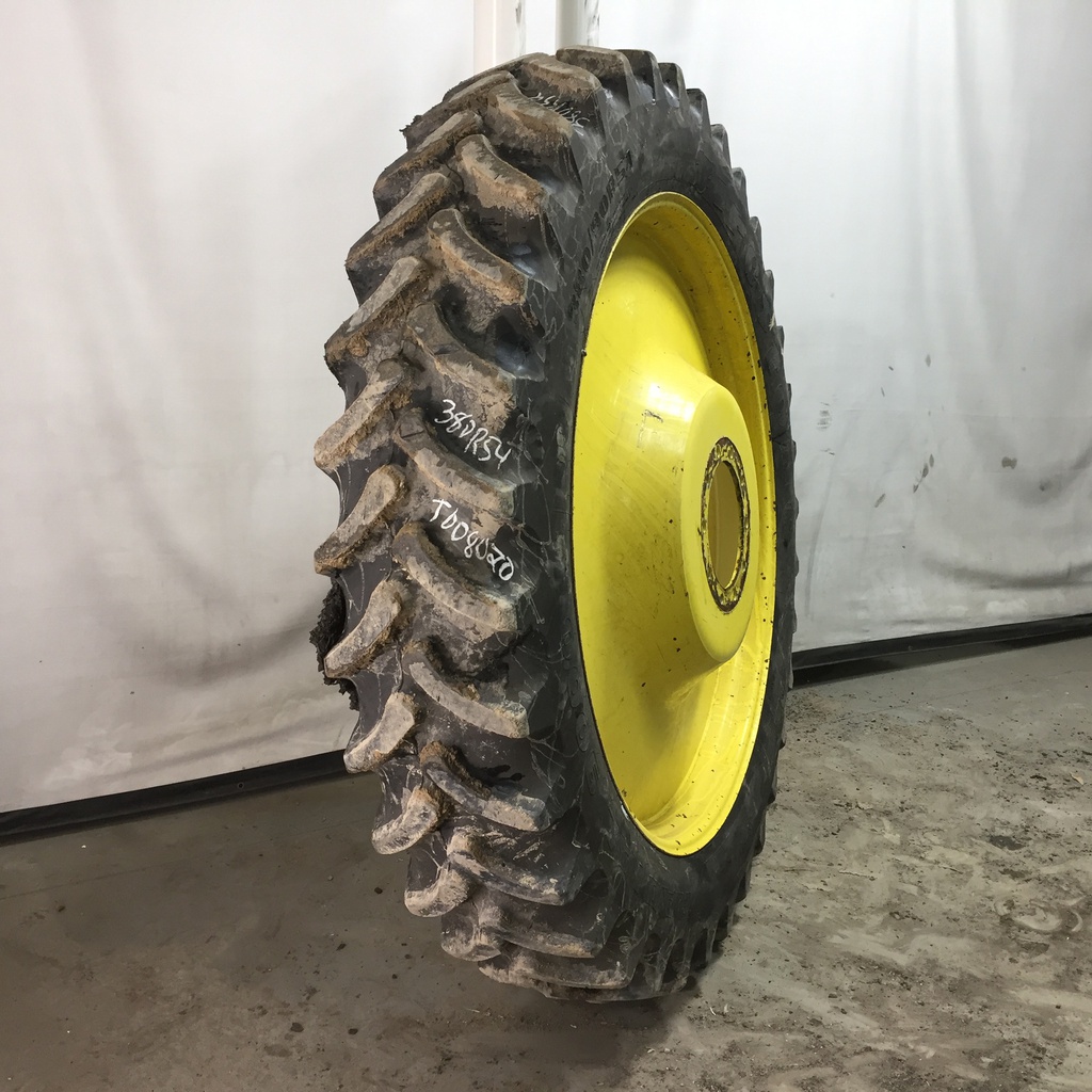 380/90R54 Firestone Radial 9000 R-1W on John Deere Yellow 10-Hole Spun Disc 80%