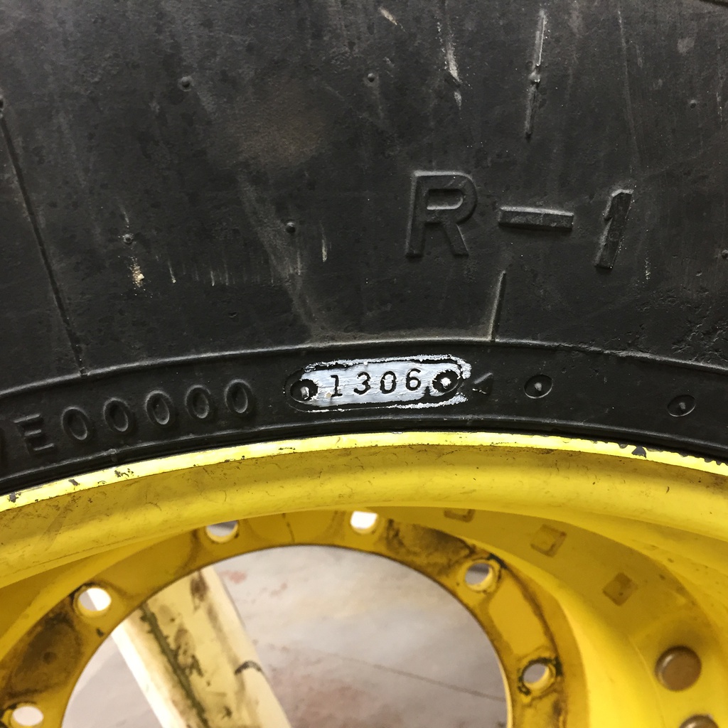 420/90R30 Firestone Radial All Traction FWD R-1 on John Deere Yellow 12-Hole Waffle Wheel (Groups of 3 bolts) 60%