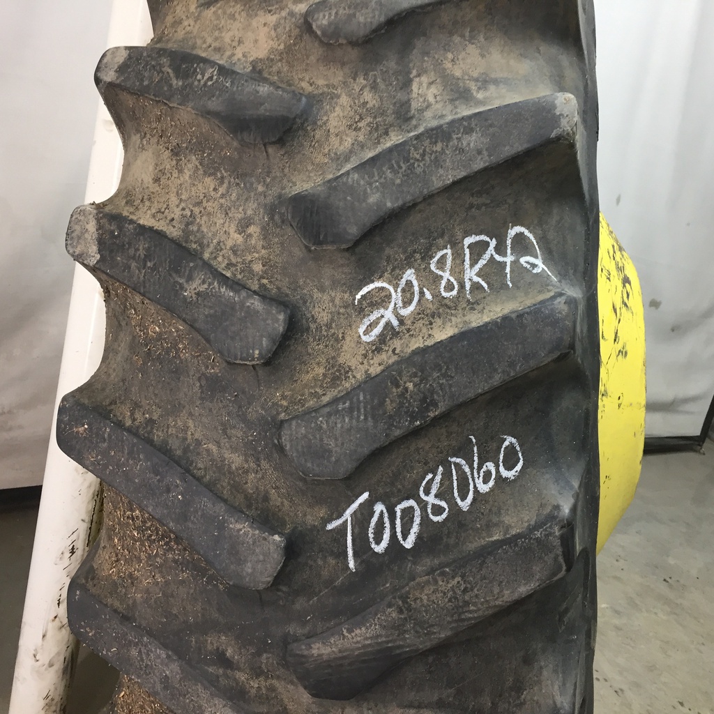 20.8/R42 Firestone Radial All Traction 23 R-1 on John Deere Yellow 10-Hole Dolly Dual 40%