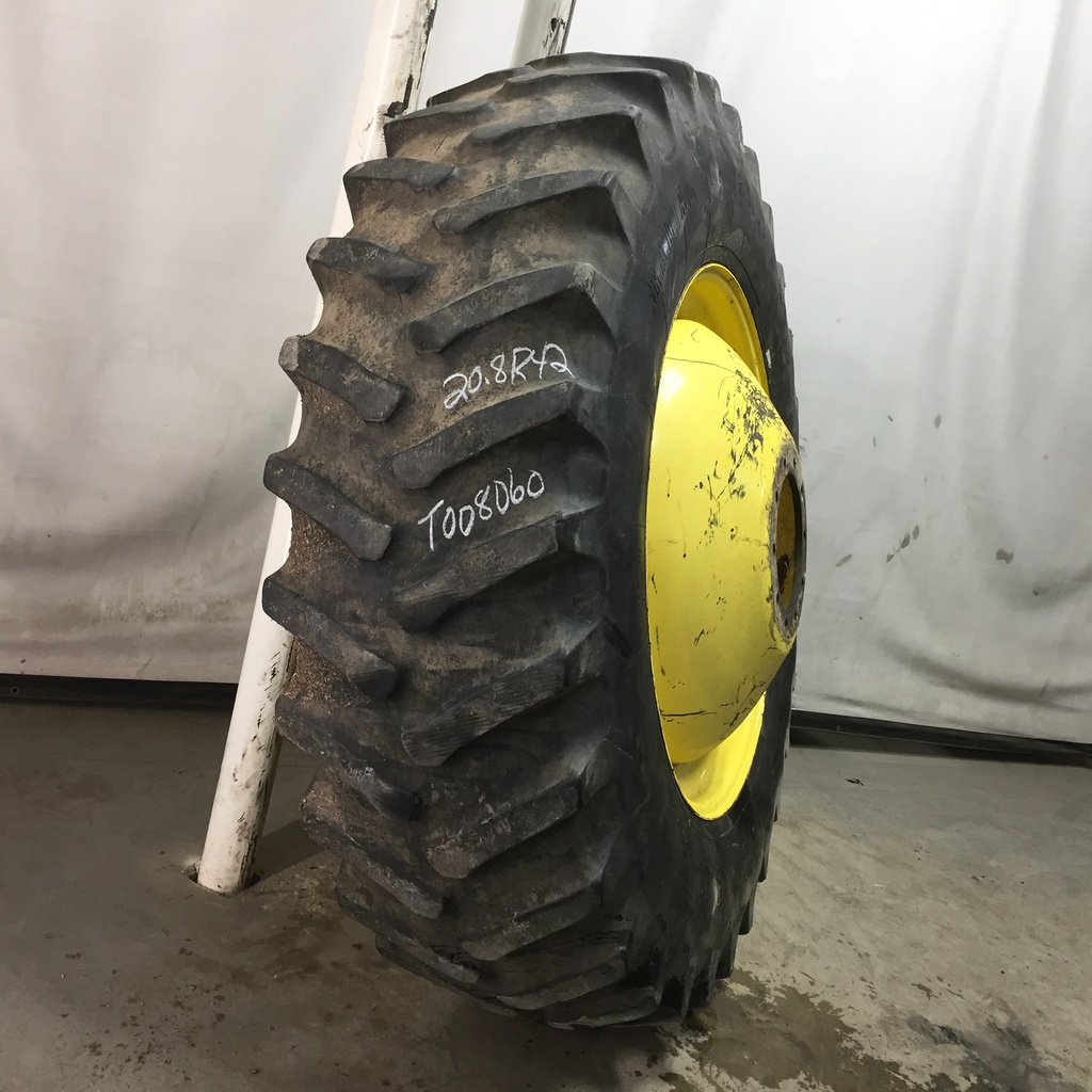 20.8/R42 Firestone Radial All Traction 23 R-1 on John Deere Yellow 10-Hole Dolly Dual 40%