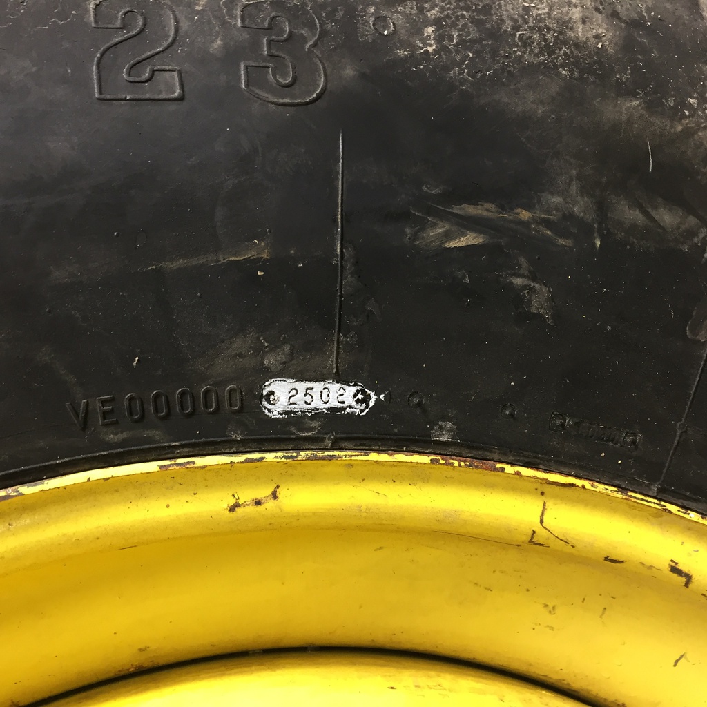 20.8/R42 Firestone Radial All Traction 23 R-1 on John Deere Yellow 10-Hole Dolly Dual 40%