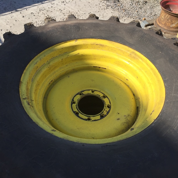 16.9/R26 Firestone Radial All Traction FWD R-1 on John Deere Yellow 8-Hole Stamped Plate 75%