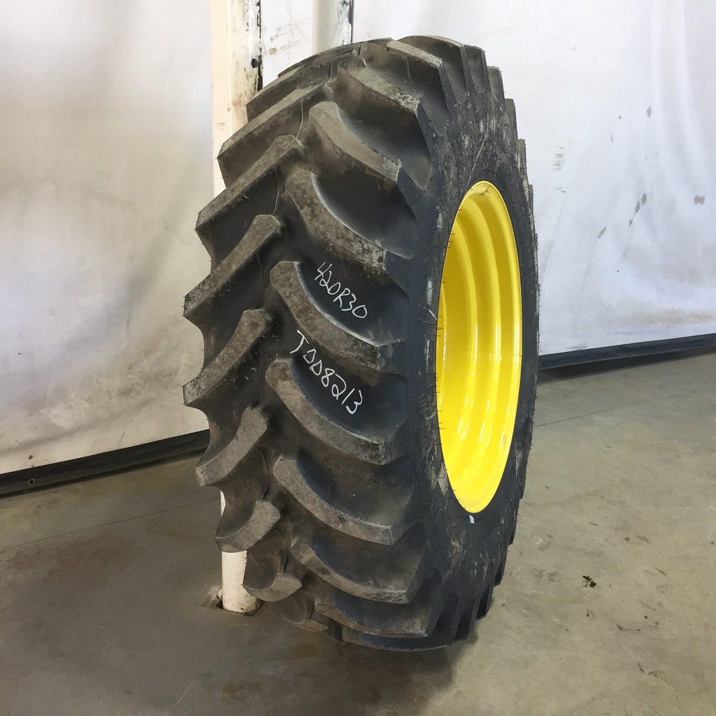 420/90R30 Firestone Radial All Traction FWD R-1 on John Deere Yellow 12-Hole Waffle Wheel (Groups of 3 bolts) 95%