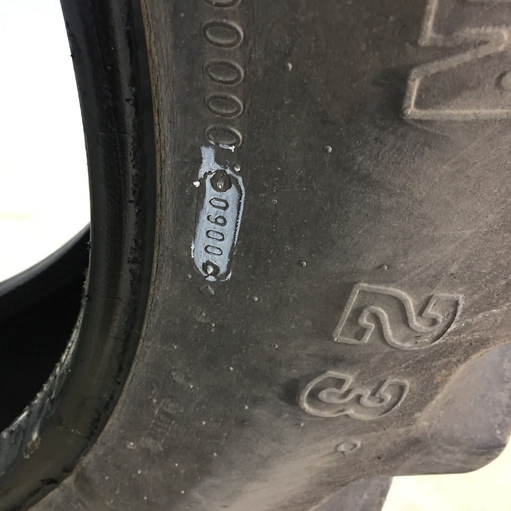 12.4/-38 Firestone Super All Traction 23 R-1, G (14 Ply) 85%