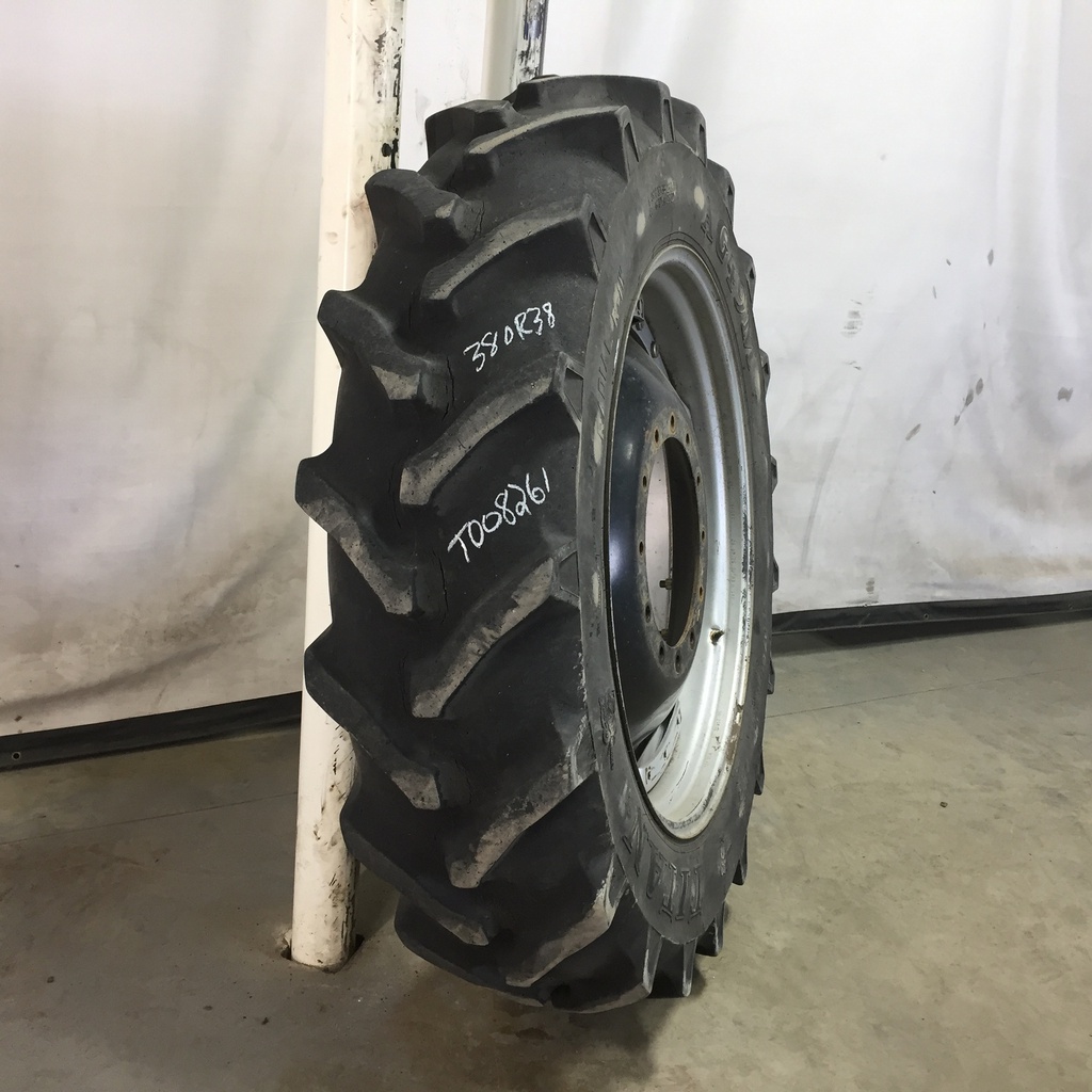 380/80R38 Titan Farm AG49M Radial R-1W on Case IH Silver Mist/Black 12-Hole Waffle Wheel (Groups of 3 bolts) 50%