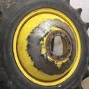 18.4/-38 Firestone Champion Spade Grip R-2 on John Deere Yellow 10-Hole Dolly Dual 80%