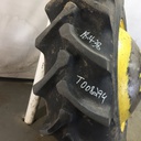18.4/-38 Firestone Champion Spade Grip R-2 on John Deere Yellow 10-Hole Dolly Dual 80%