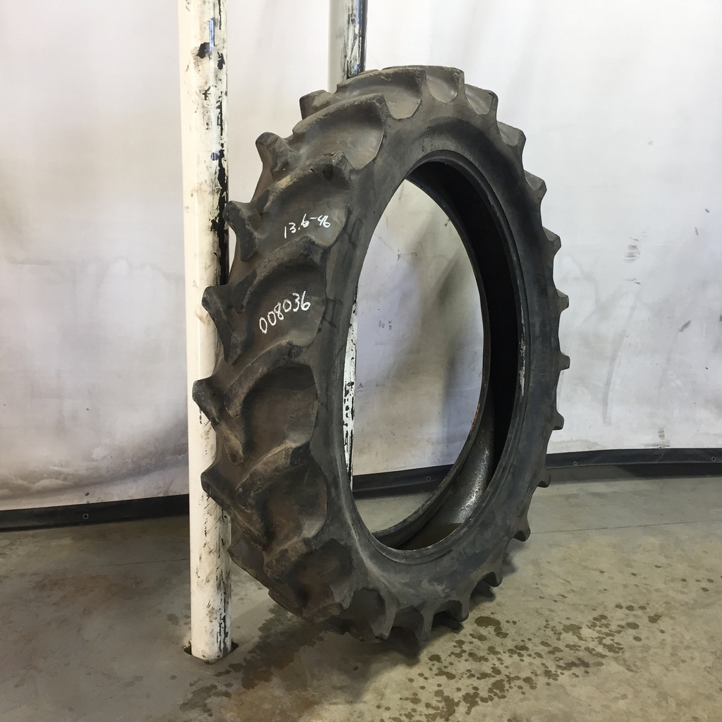 13.6/-46 Firestone Champion Spade Grip R-2 A8, C (6 Ply) 60%