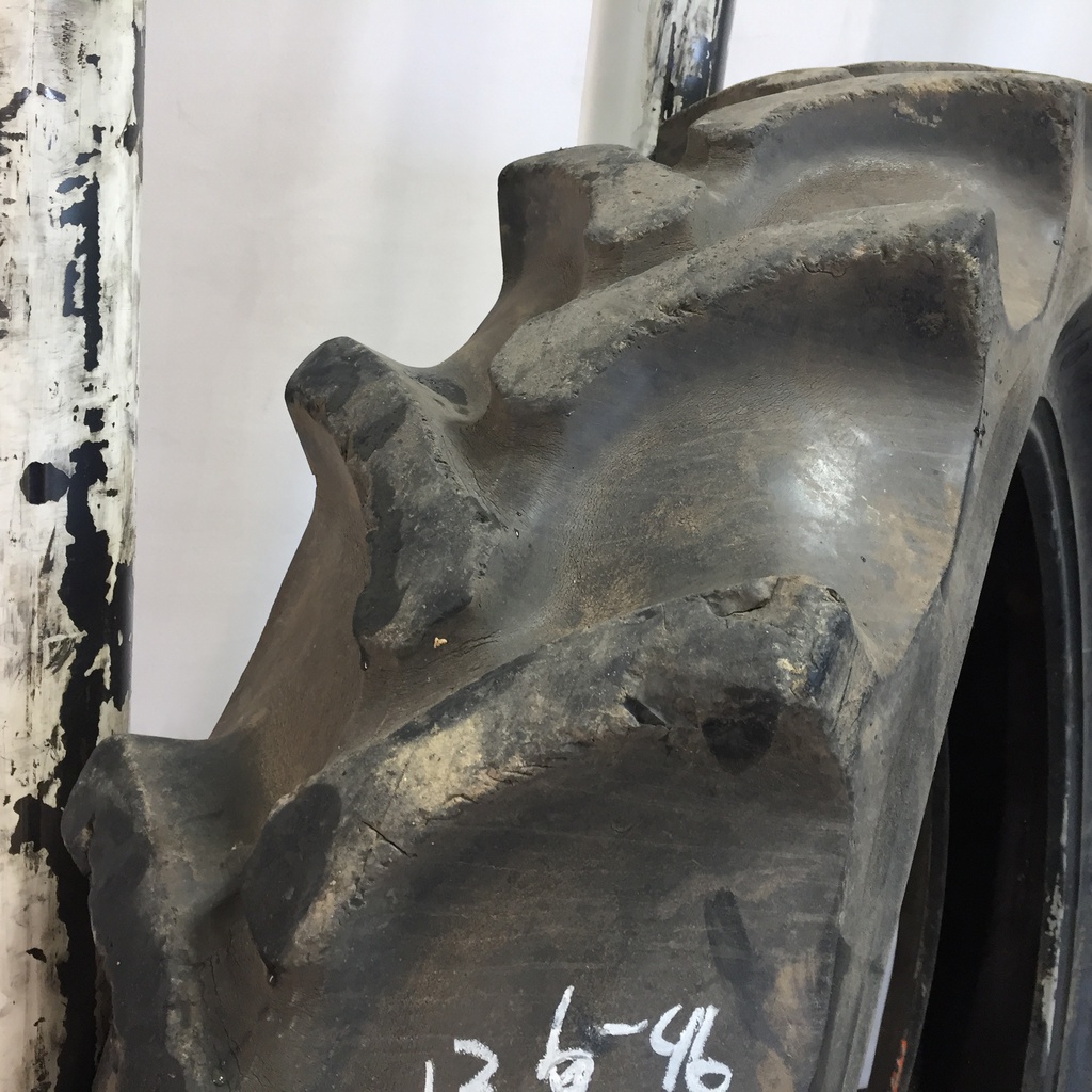 13.6/-46 Firestone Champion Spade Grip R-2 A8, C (6 Ply) 60%