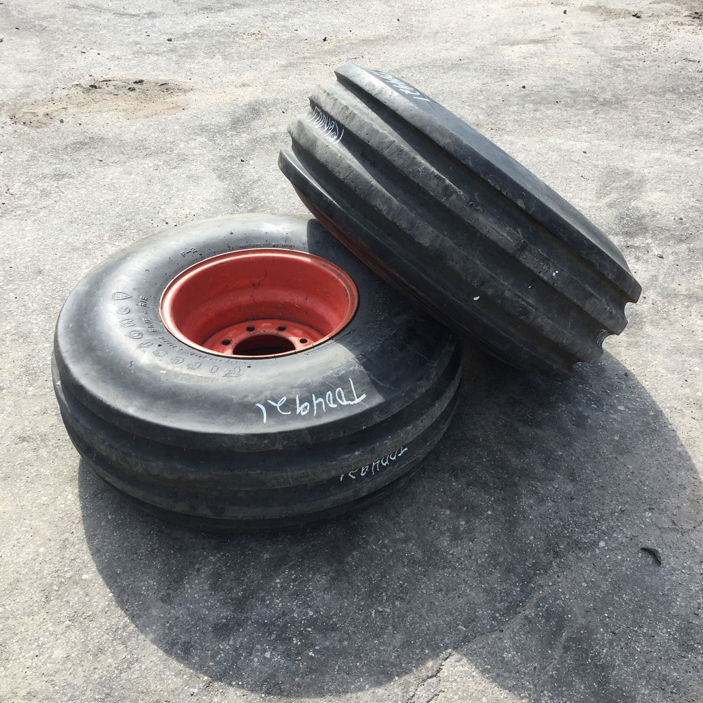 14/L-16.1 Firestone Champion Guide Grip 4-Rib SS F-2M on Orange 8-Hole Formed Plate 75%