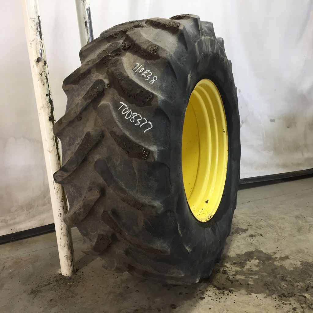 710/70R38 Firestone Radial All Traction DT R-1W on John Deere Yellow 10-Hole Formed Plate W/Weight Holes 45%