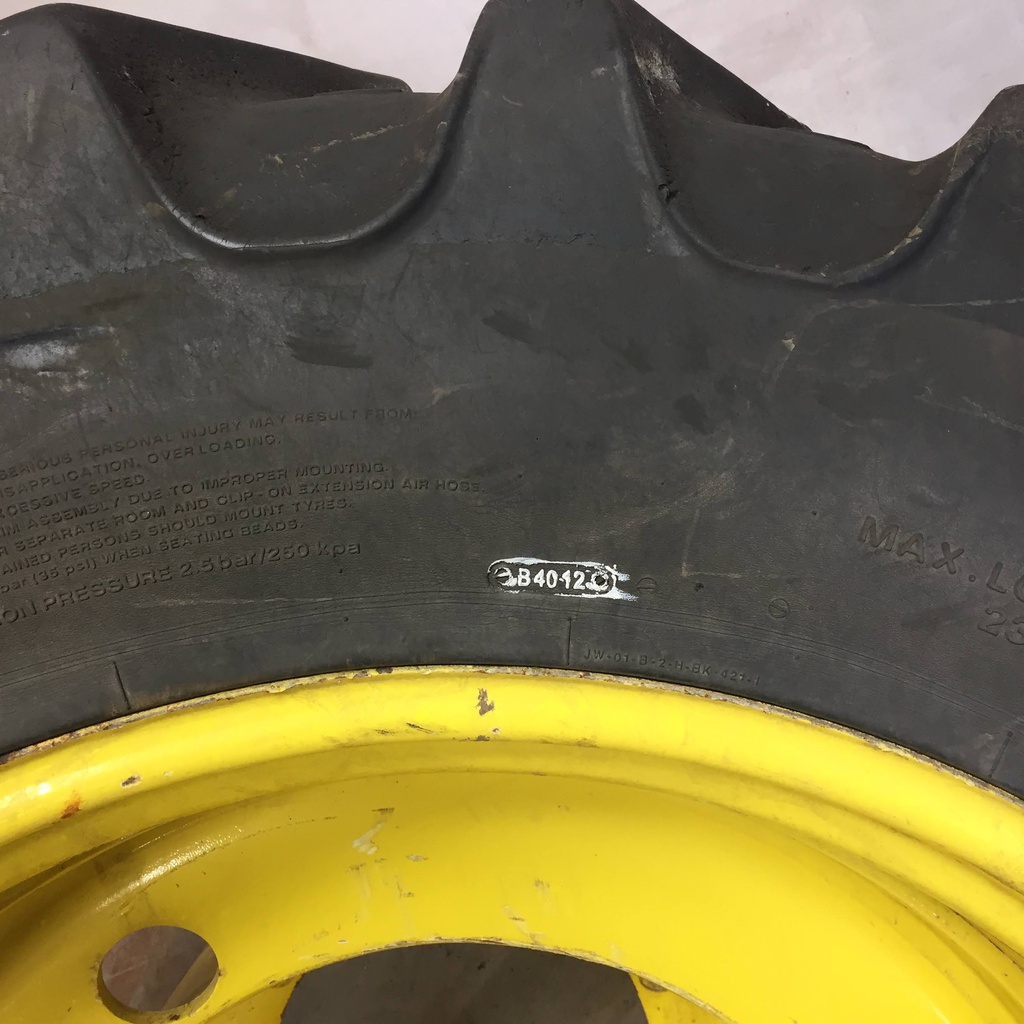 380/85R34 BKT Tires Agrimax RT 855 R-1W on John Deere Yellow 12-Hole FWA Direct Bolt Dual 65%