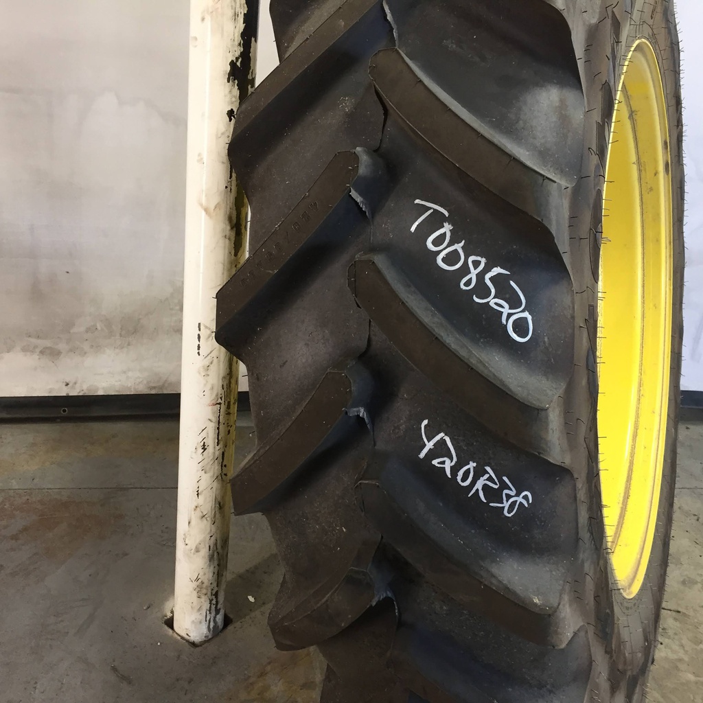 420/85R38 Firestone Performer EVO R-1W on John Deere Yellow 8-Hole Stub Disc (groups of 2 bolts) 99%