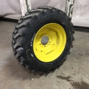 260/70D16.5 Titan Farm Trac Loader SS R-4 on John Deere Yellow 6-Hole Formed Plate 99%