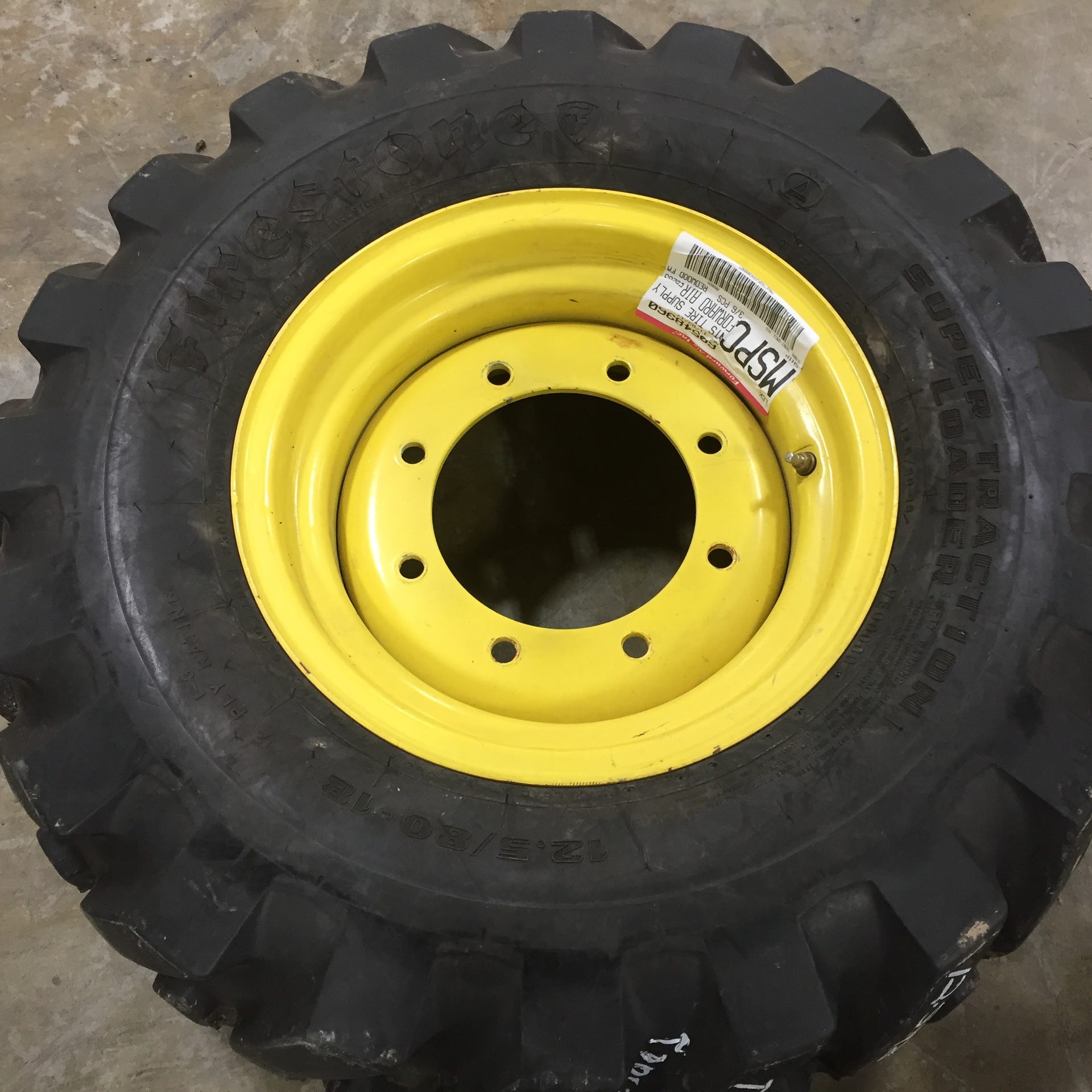 Used12.5/8018 Firestone Super Traction Loader I3 on Formed Plate