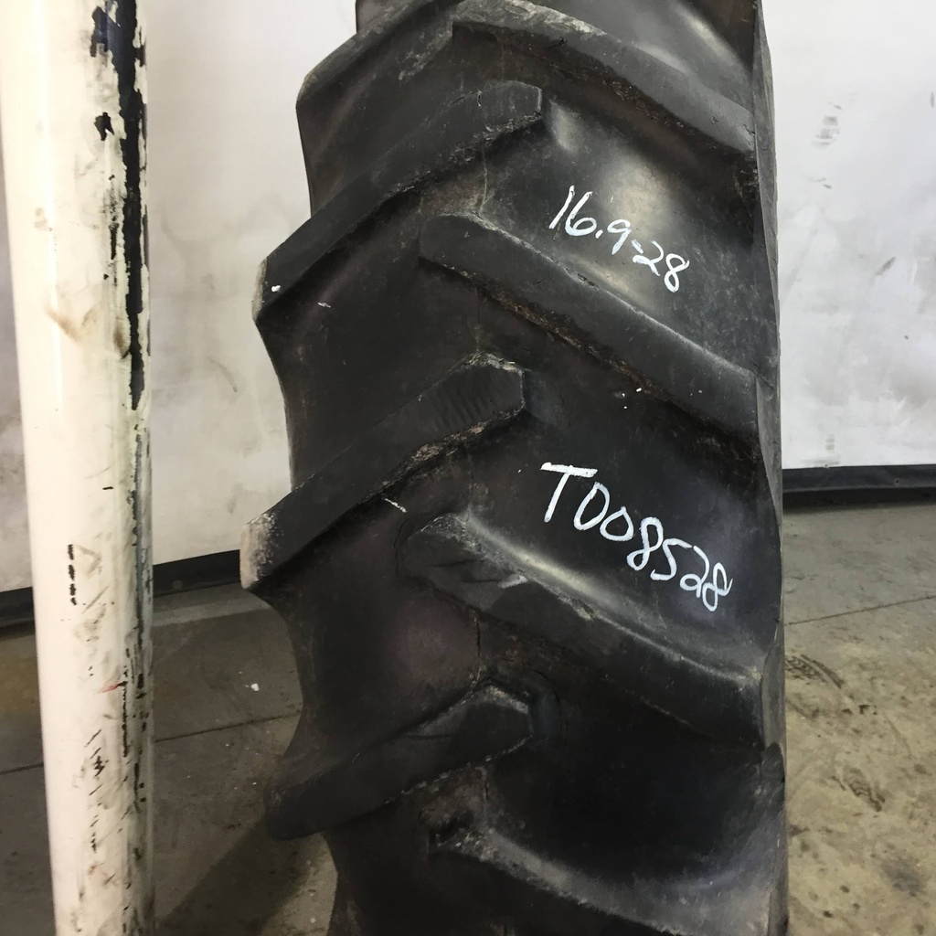 16.9/-28 BF Goodrich Power Grip  R-1 on Case IH Silver Mist 6-Hole Rim with Clamp/Loop Style 60%