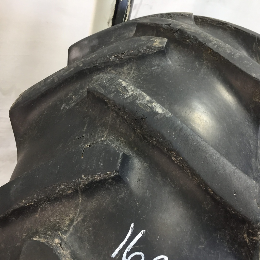 16.9/-28 BF Goodrich Power Grip  R-1 on Case IH Silver Mist 6-Hole Rim with Clamp/Loop Style 60%