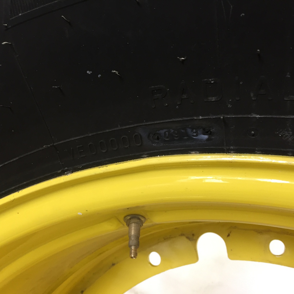 800/70R38 Firestone Radial Deep Tread 23 R-1W on John Deere Yellow 12-Hole Stub Disc 99%