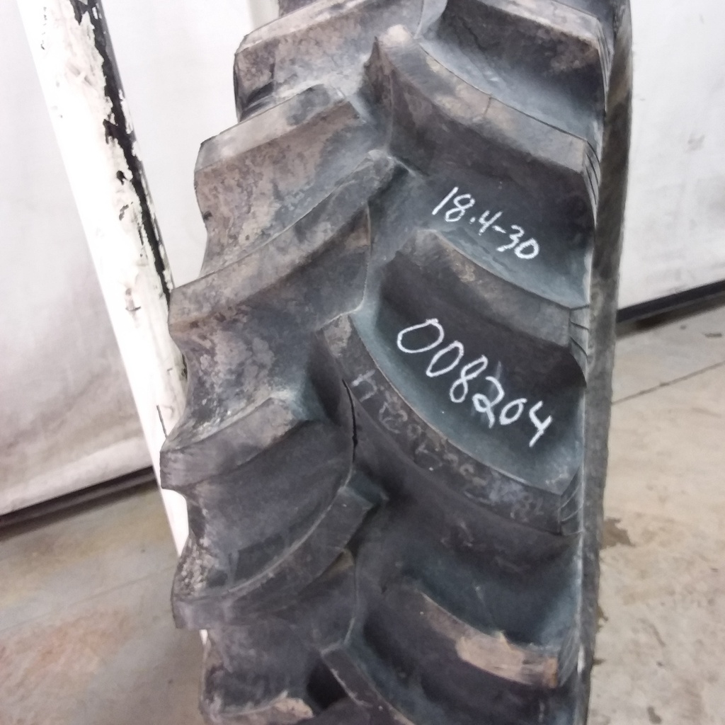 18.4/-30 Titan Farm Hi Traction Lug R-1, C (6 Ply) 95%