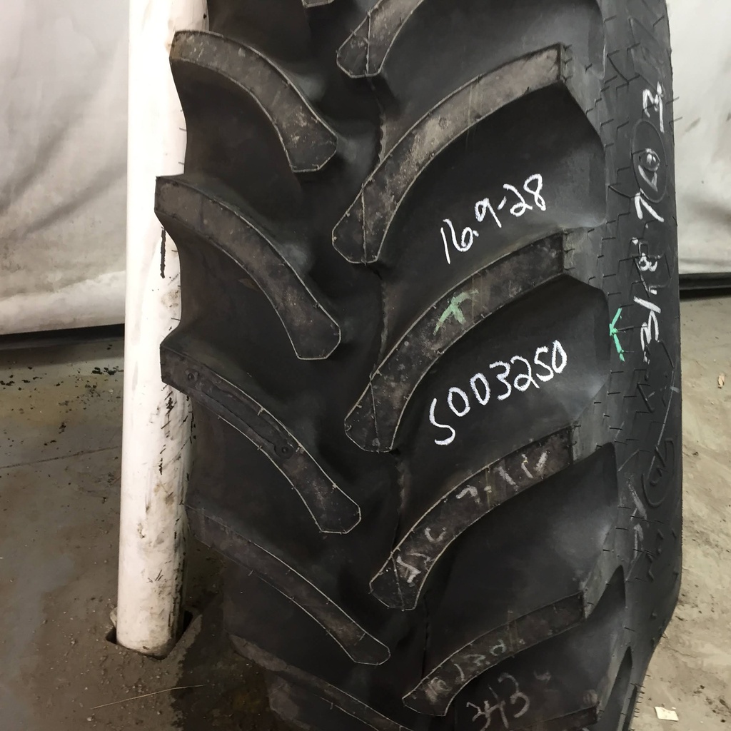 16.9/-28 Firestone Super All Traction FWD R-1 A8, E (10 Ply) 99%