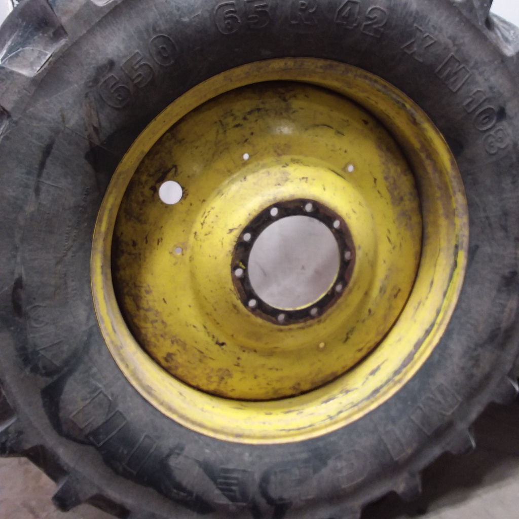 650/65R42 Michelin Multibib(XM108) R-1W on John Deere Yellow 10-Hole Formed Plate W/Weight Holes 65%