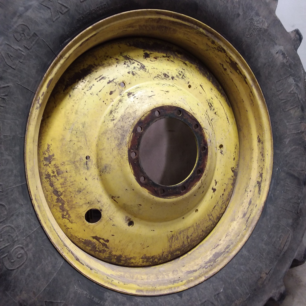 650/65R42 Michelin Multibib(XM108) R-1W on John Deere Yellow 10-Hole Formed Plate W/Weight Holes 65%