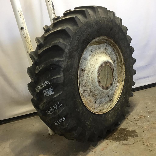 [T006884] 520/85R38 Firestone Radial All Traction 23 R-1 on New Holland White 10-Hole Formed Plate 80%